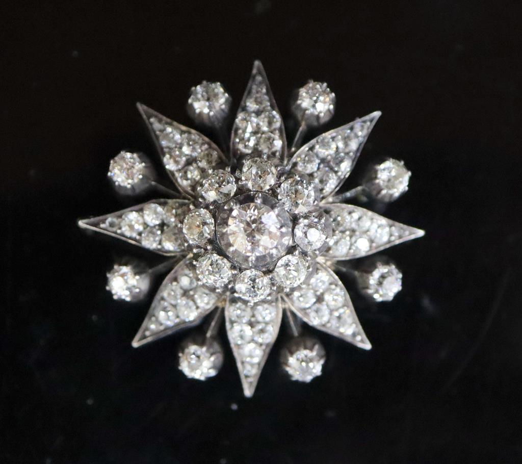 A Victorian gold, silver and diamond starburst pendant,